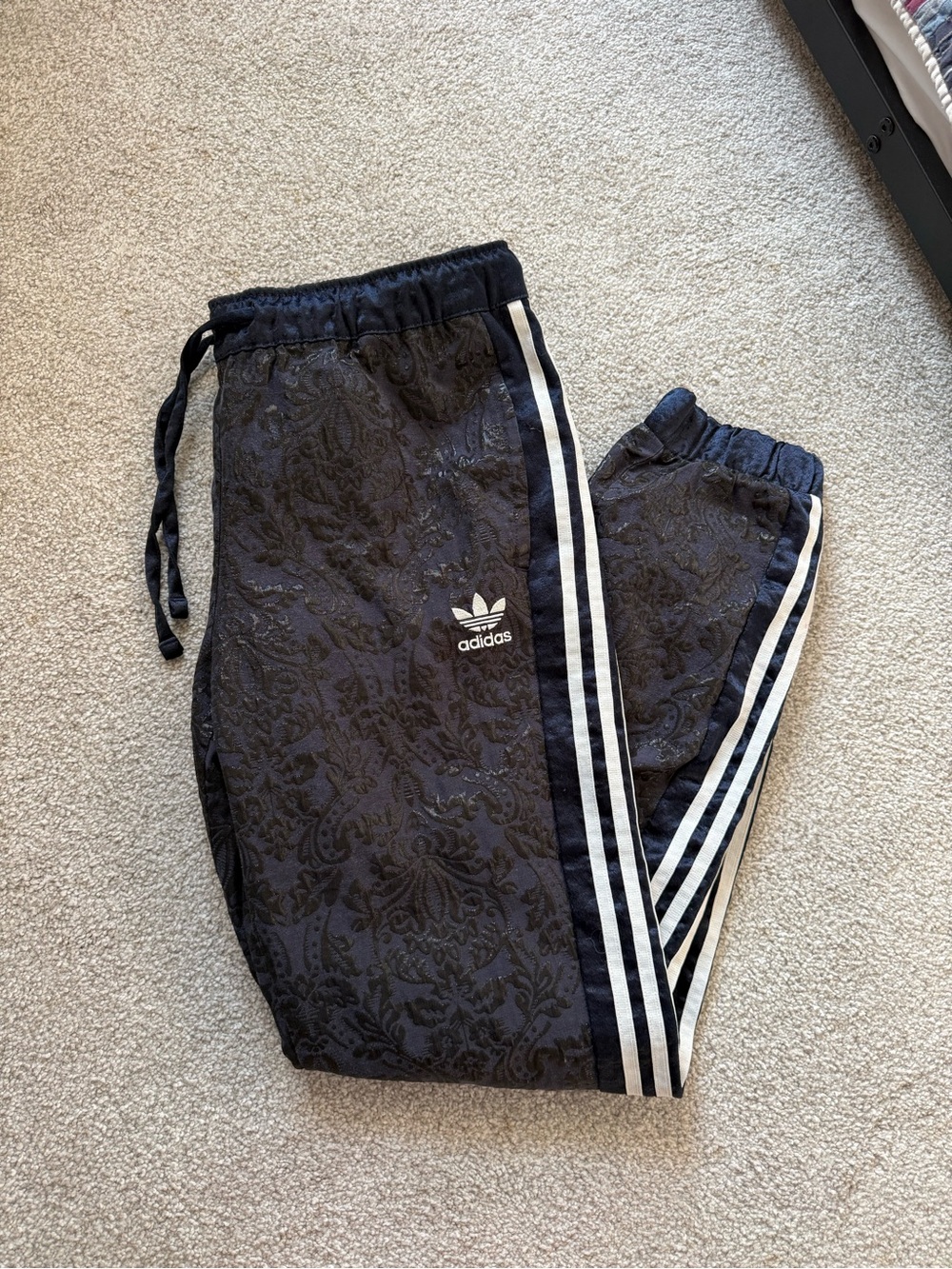 adidas Black Track Pants with Iconic Three Stripes and Paisley Design